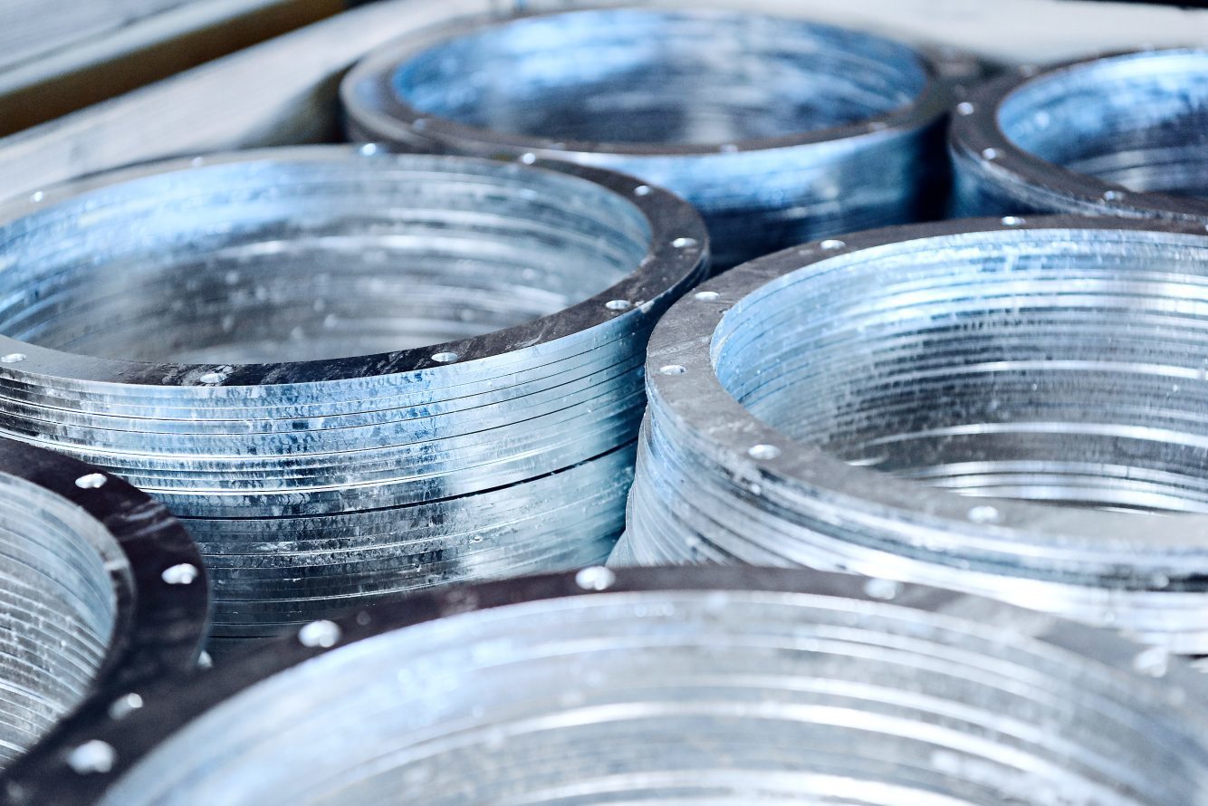 Finished circular metal components on Hosta's surface-treatment coordination page.